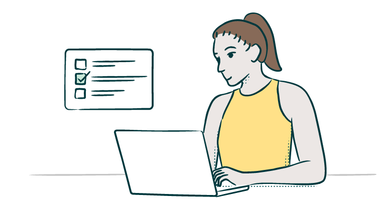 Woman using laptop filling out survey